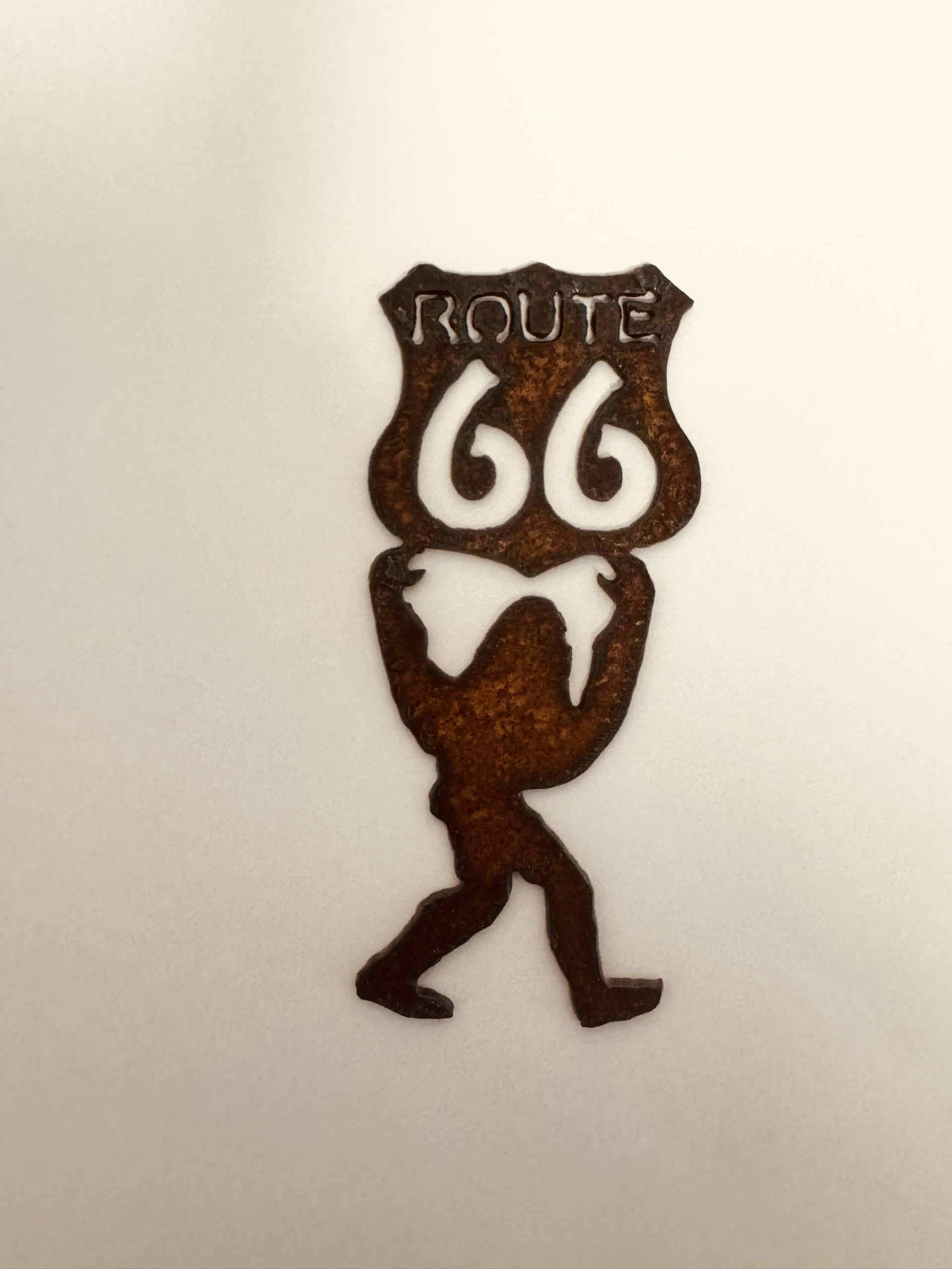 Route 66 Bigfoot Rustic Metal Magnet